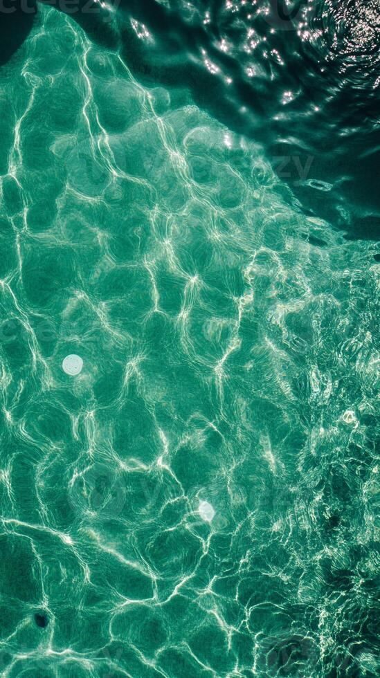 Shallow Water with Light Reflection and Two Submerged Objects photo