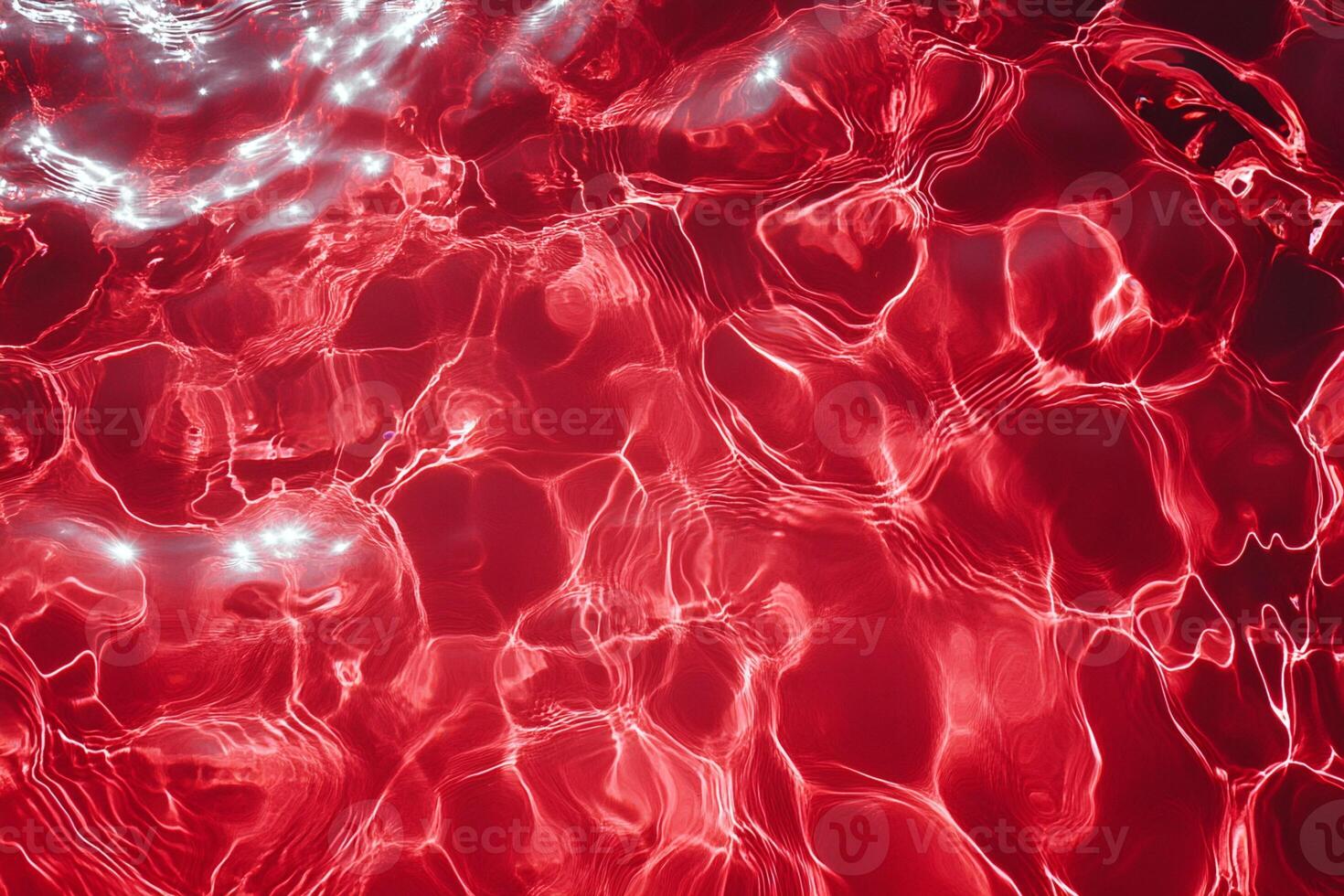 Red Water Surface Ripples and Light Reflections photo