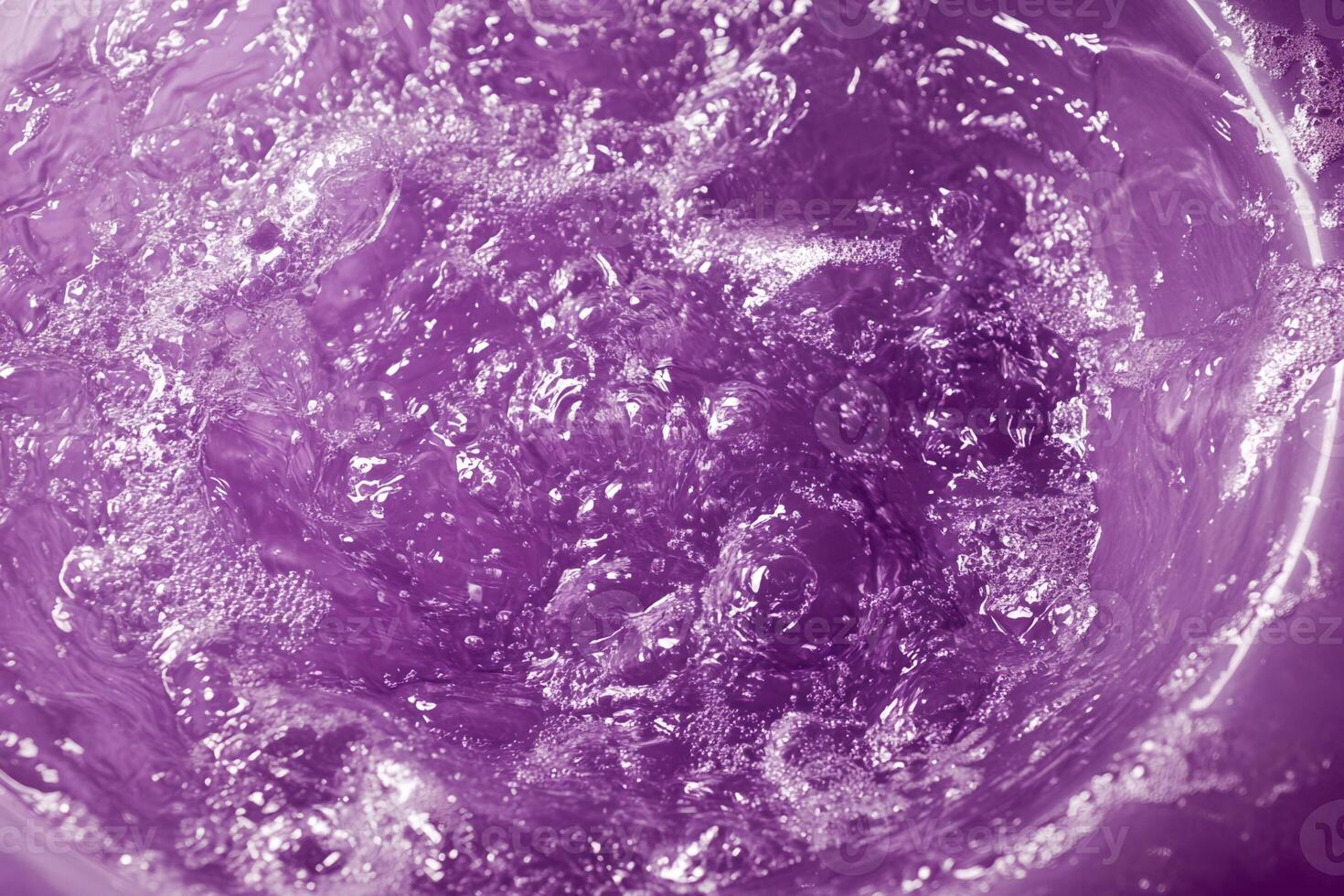Purple Liquid with Bubbles in Container photo