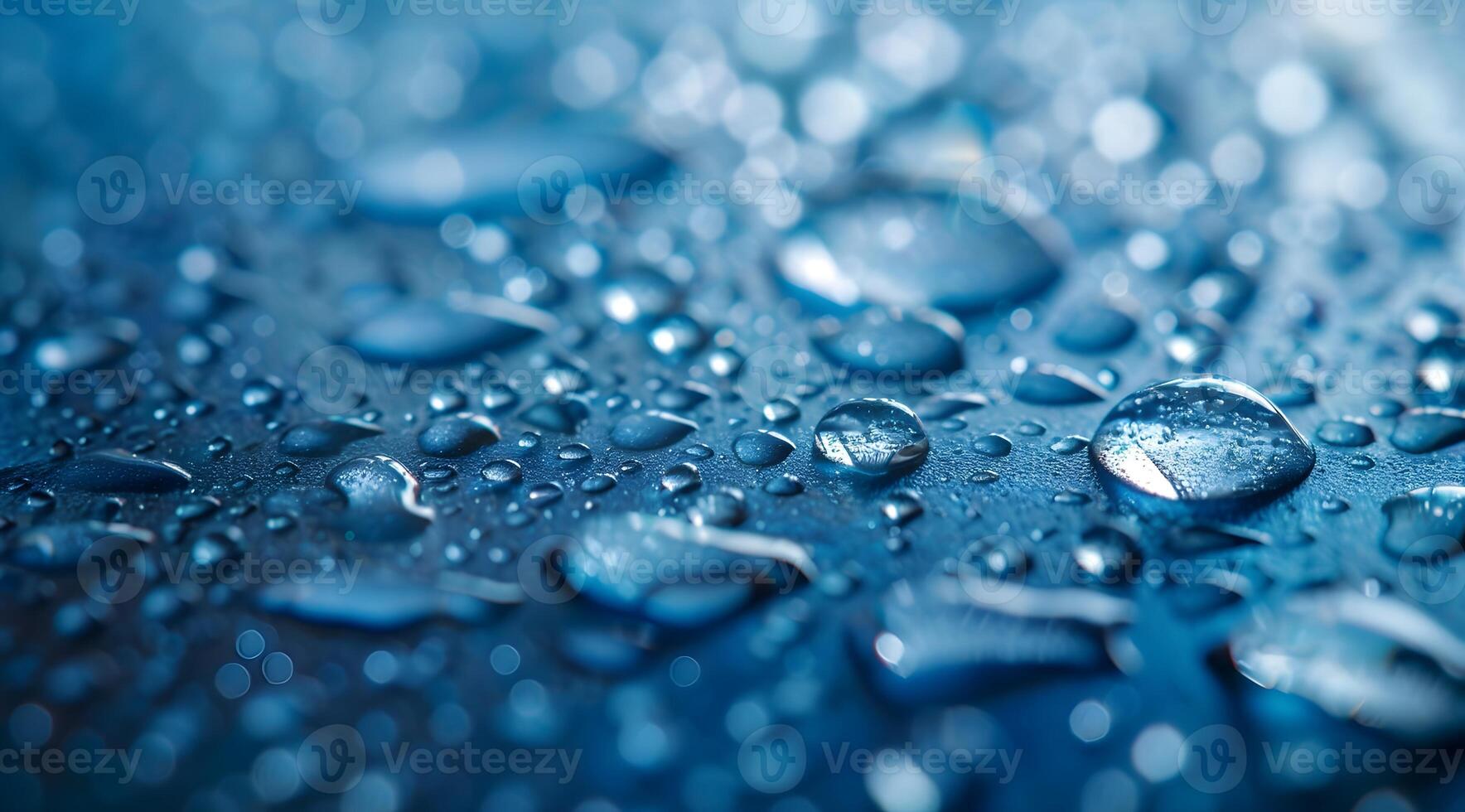Close-up of Water Drops on a Smooth Surface Showing Crystal Clarity and Reflections photo