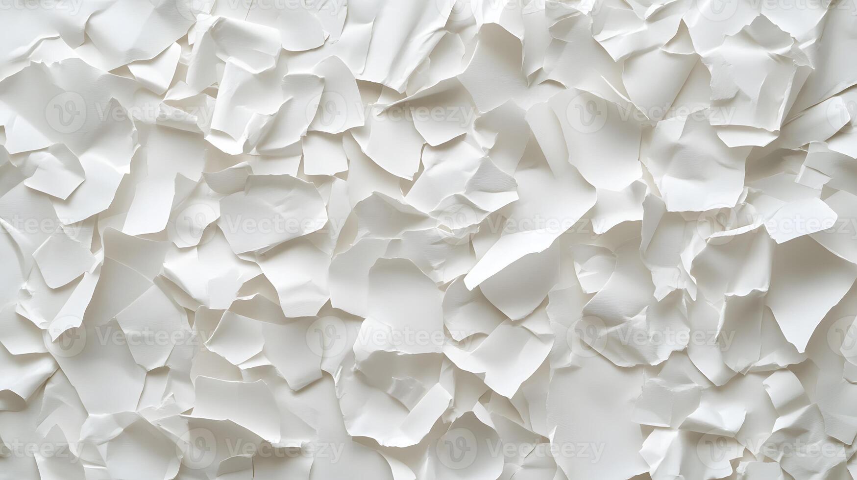 Collection of Irregularly Shaped, Crumpled White Paper Fragments photo