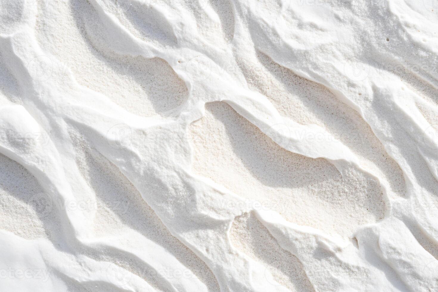Textured White Sand with Wave Patterns photo