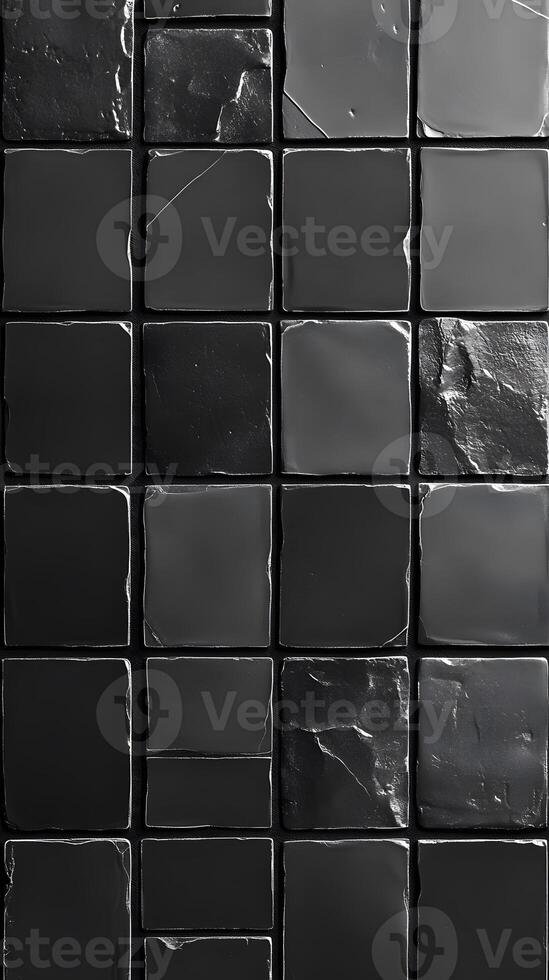 Grid of Dark Gray Square Tiles with Textural Variations photo