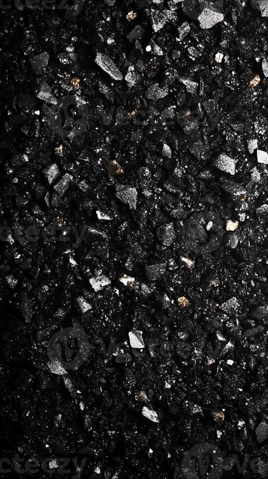 Black and Gray Granular Material with Gold Flecks photo