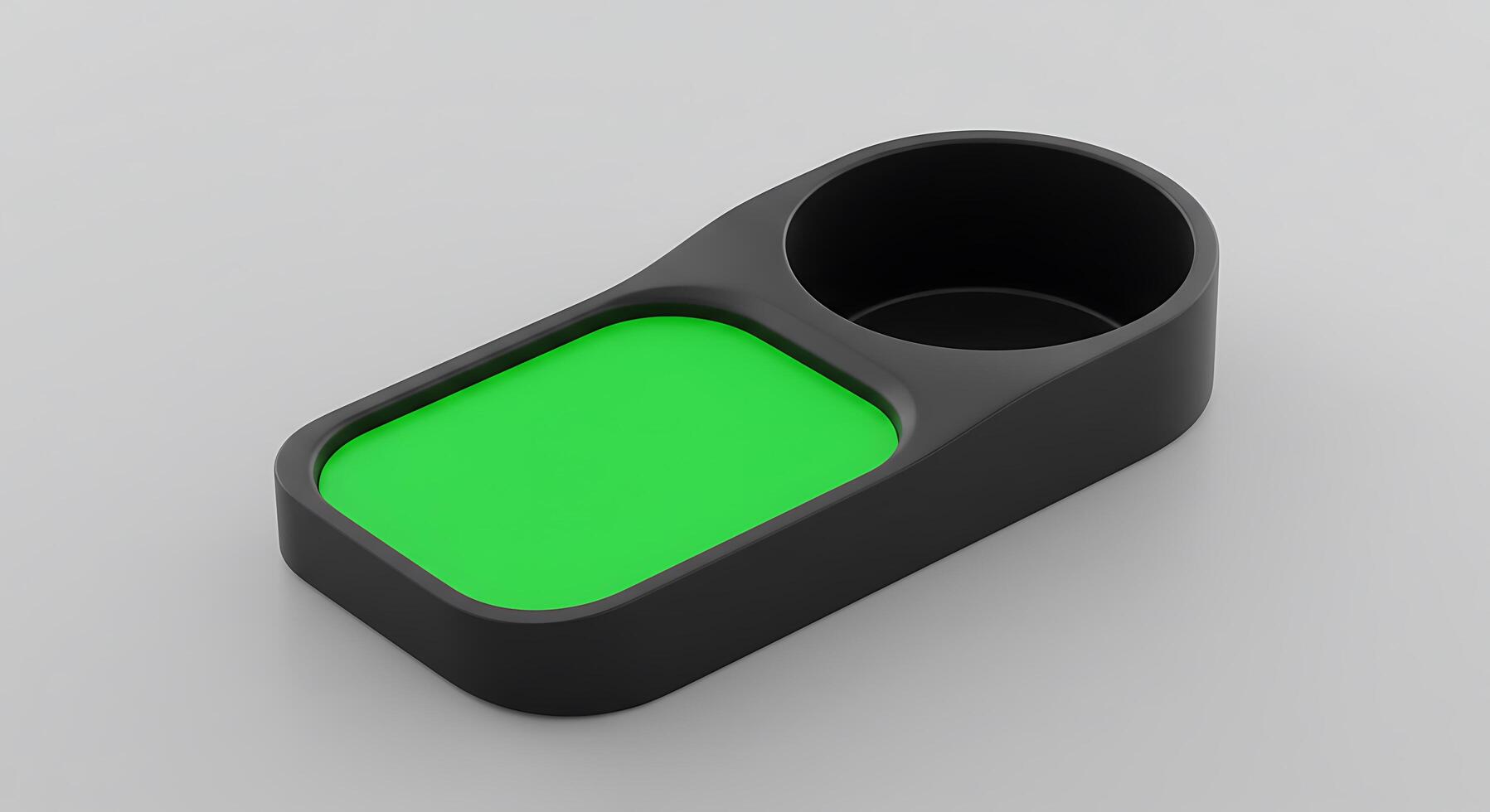 A black and green object with a green button photo