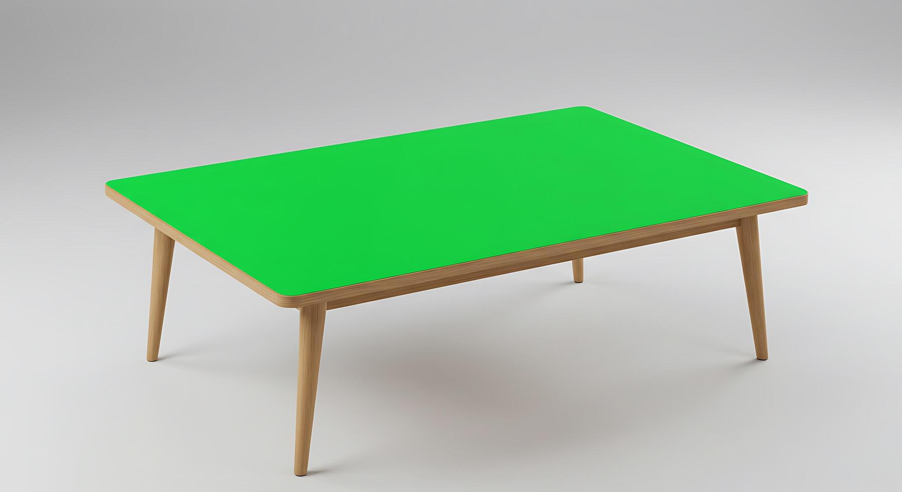 A green table with wooden legs and a square top photo