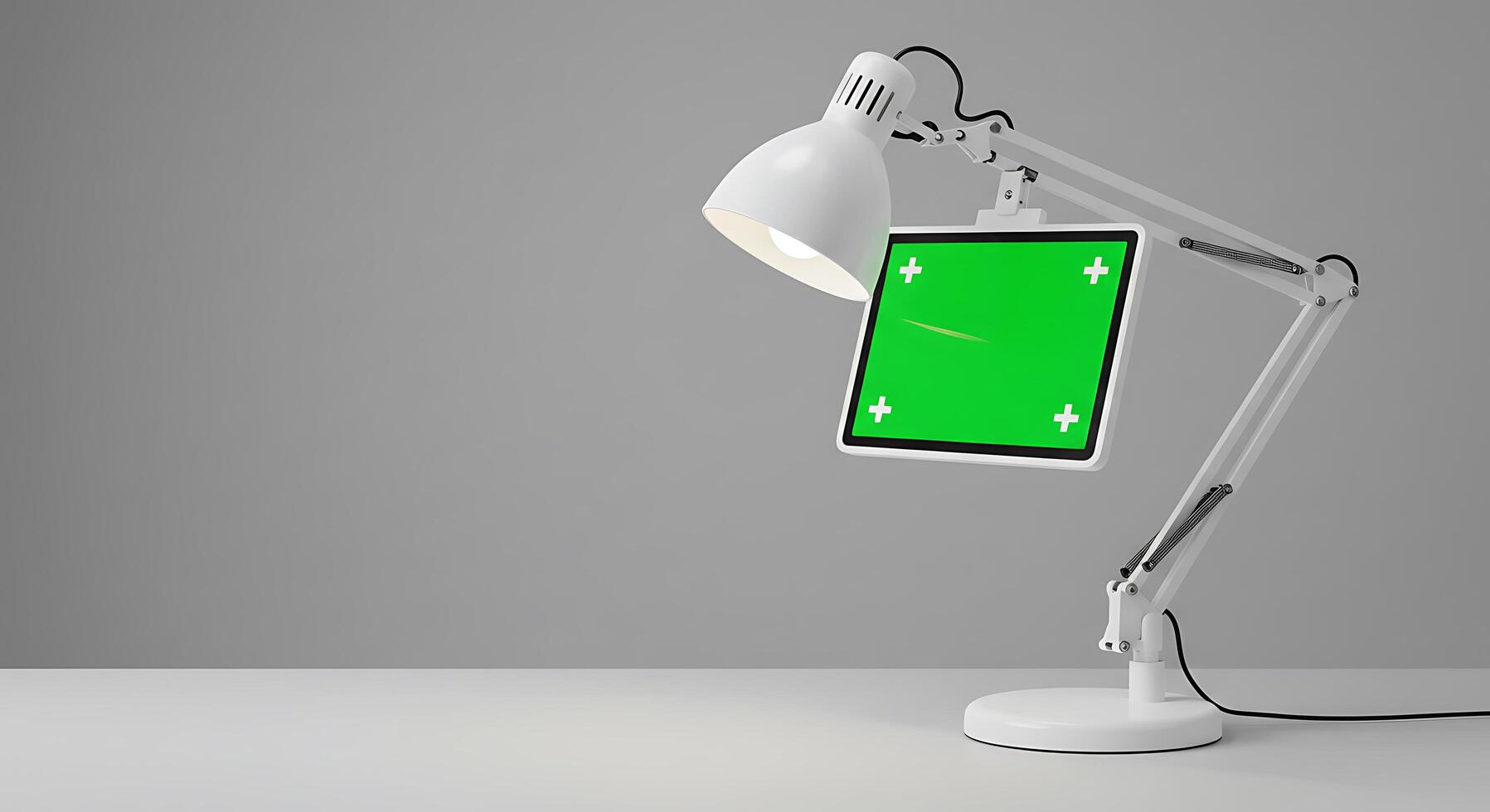 A desk lamp with a green screen on it photo
