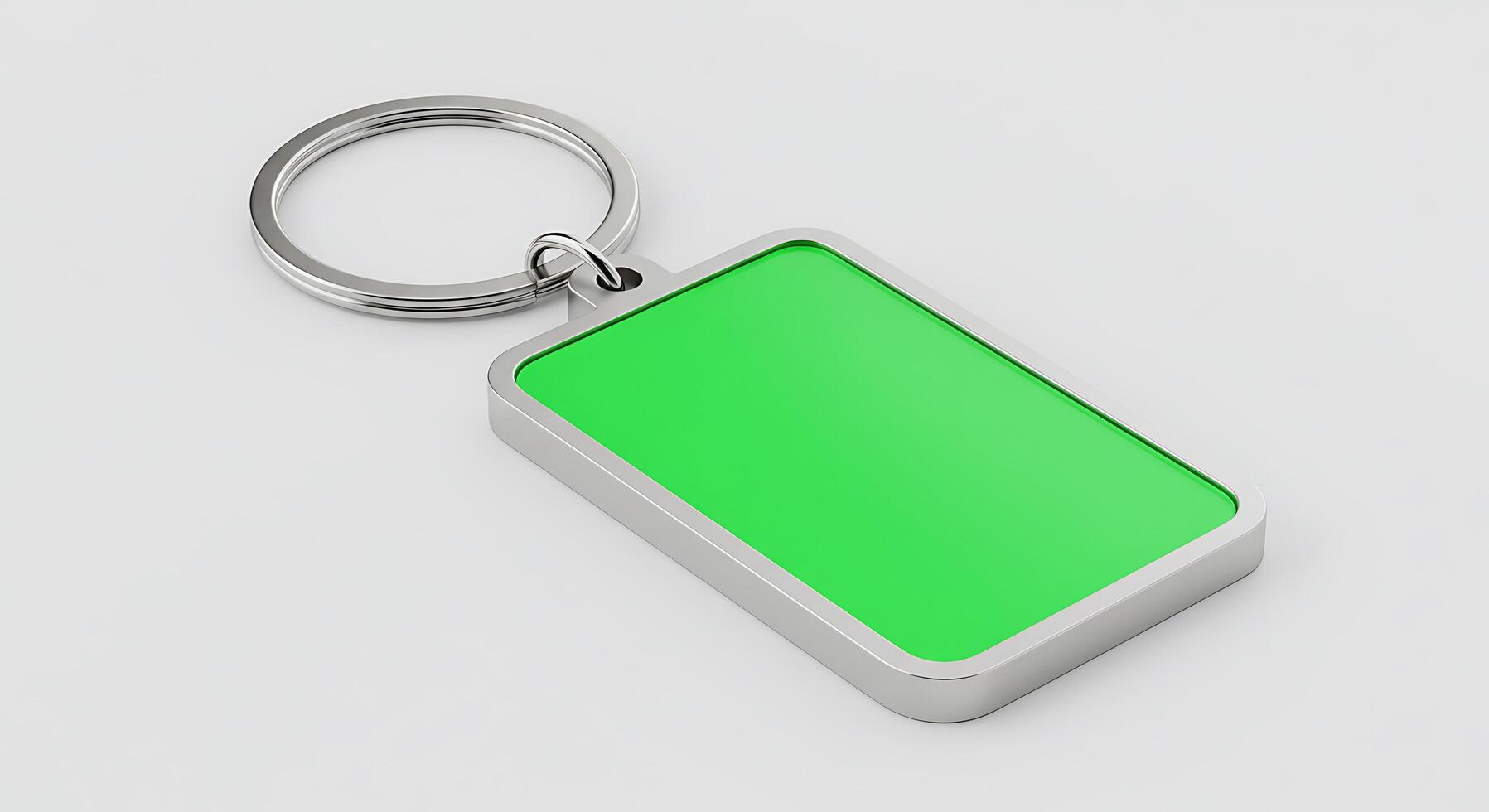 A green keychain with a silver frame photo