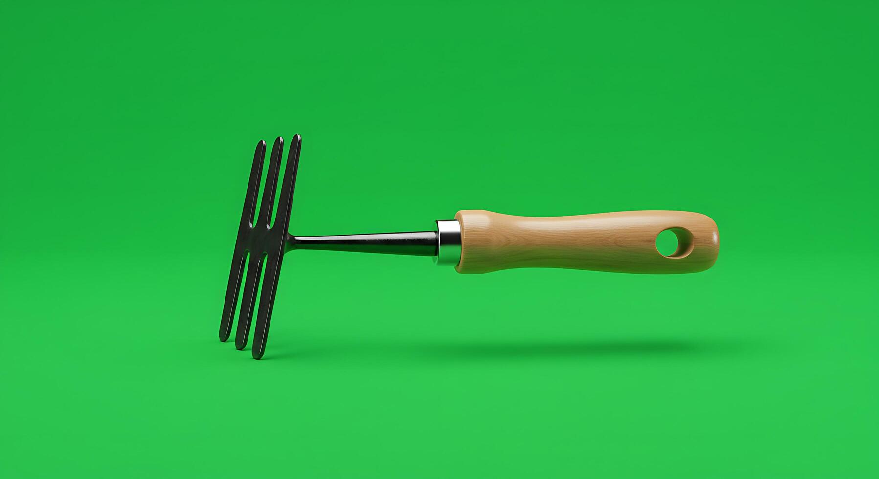 A green background with a wooden tool on it photo