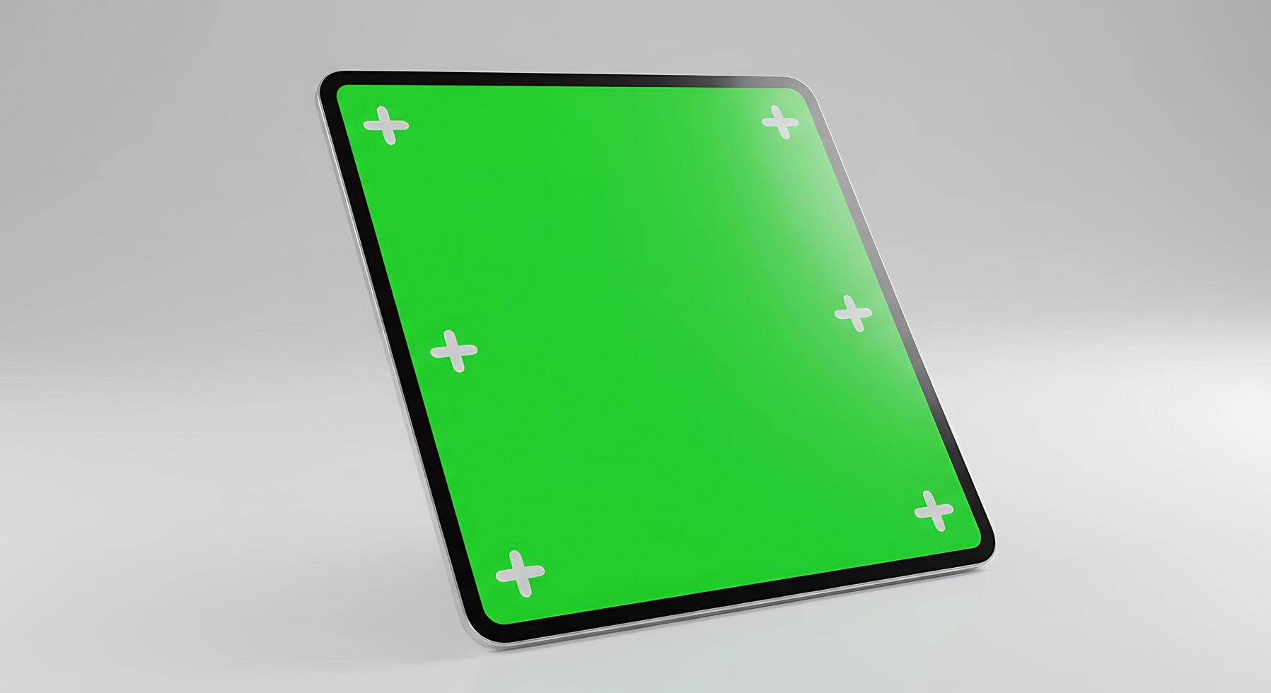 A tablet computer with a green screen on it photo