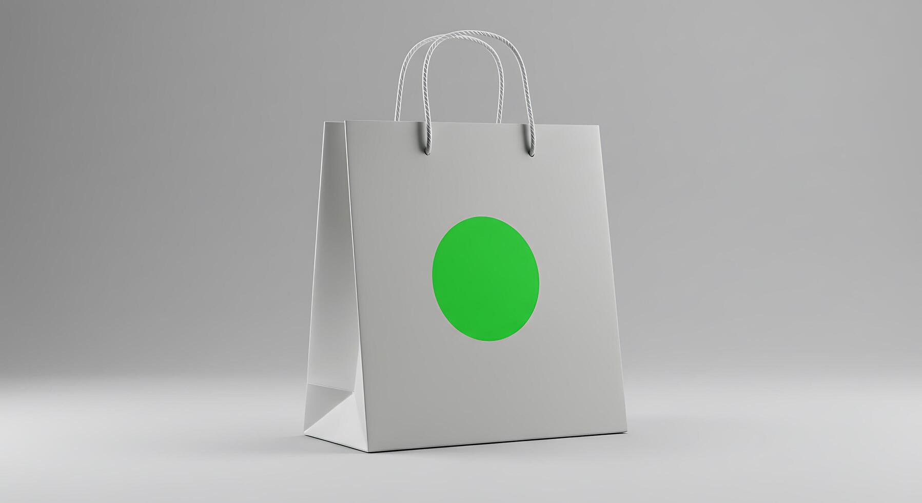 A green paper bag with a white handle photo