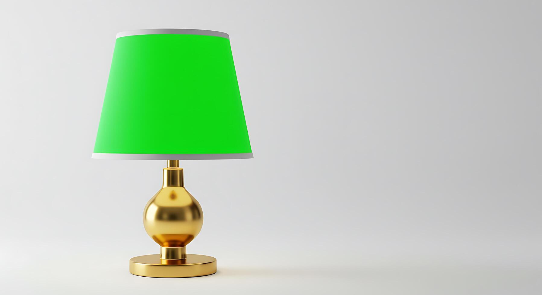 A green lamp on a table with a gold base photo