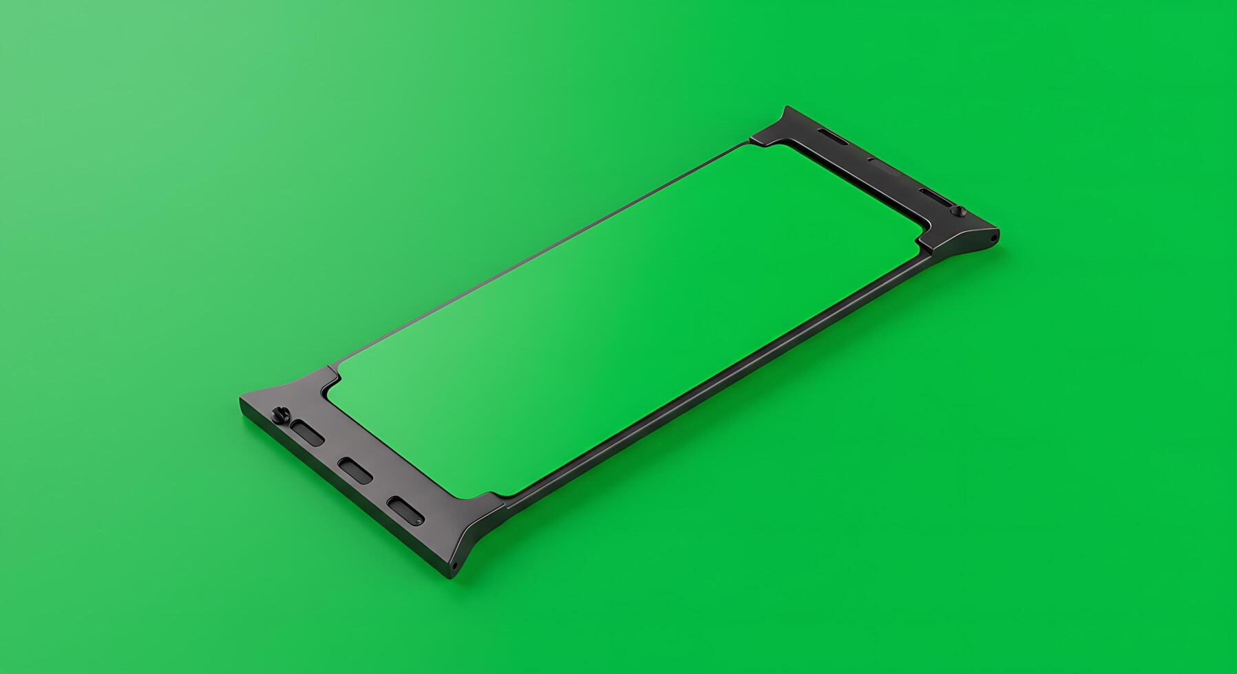 A black phone on a green background photo