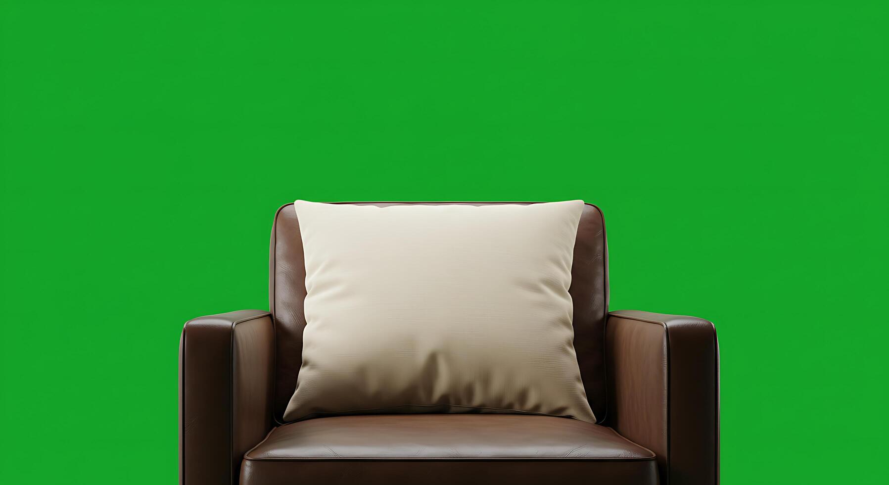 A chair with a pillow on a green screen photo