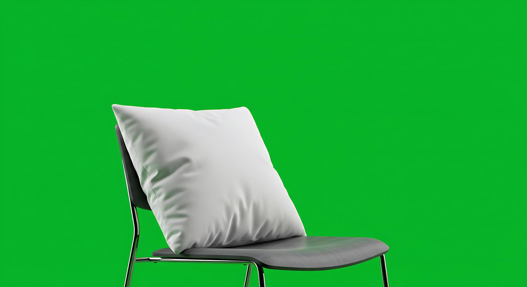 A chair with a pillow on a green screen photo
