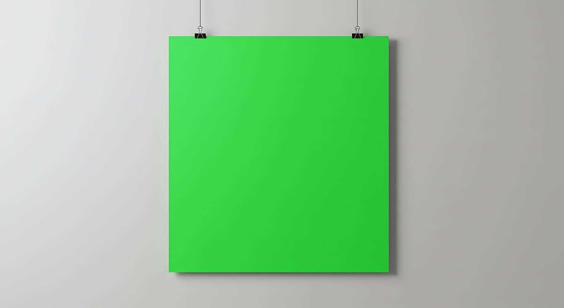 Green blank poster hanging on a wall photo
