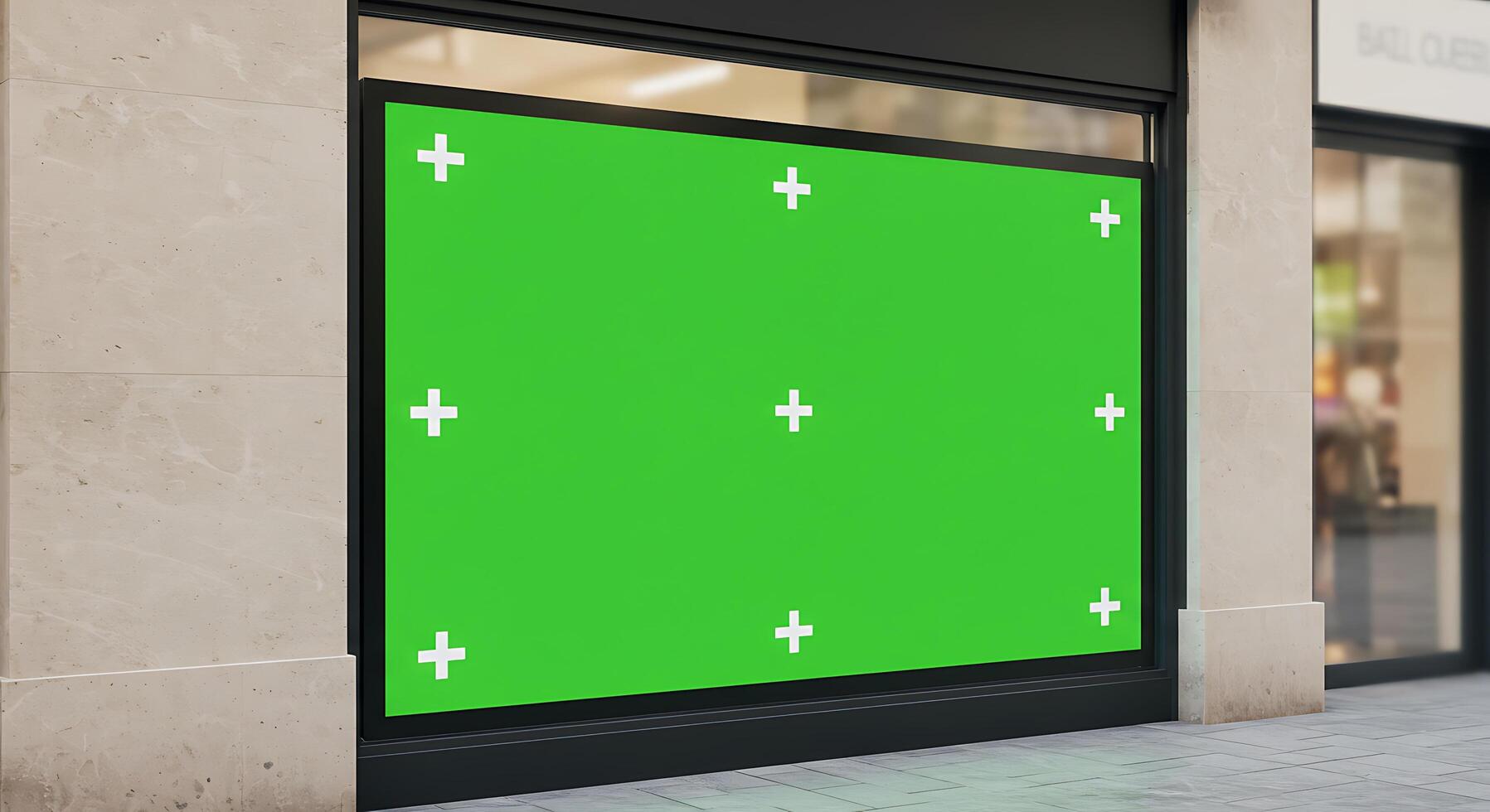 A green screen in front of a store photo