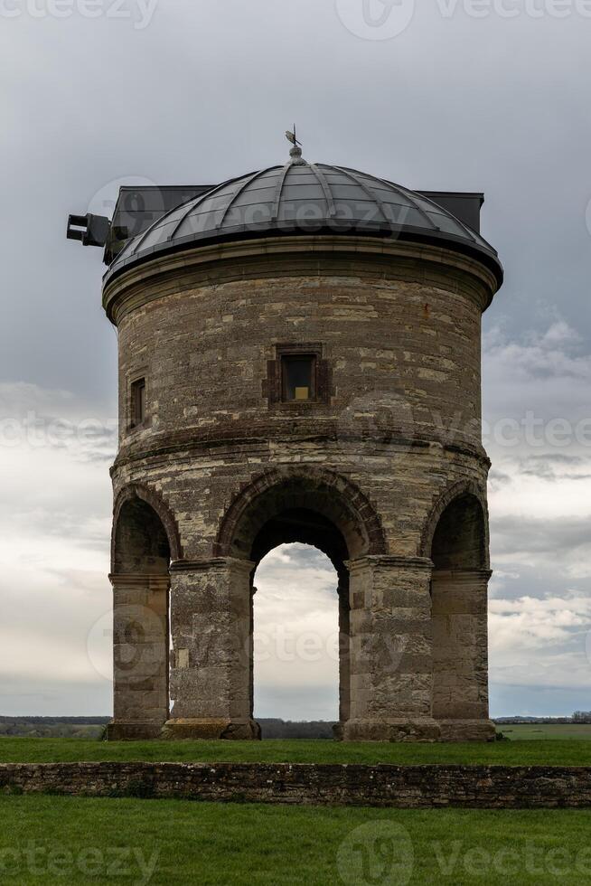 Burton Pynsent Monument standing tall in Somerset countryside under cloudy sky photo