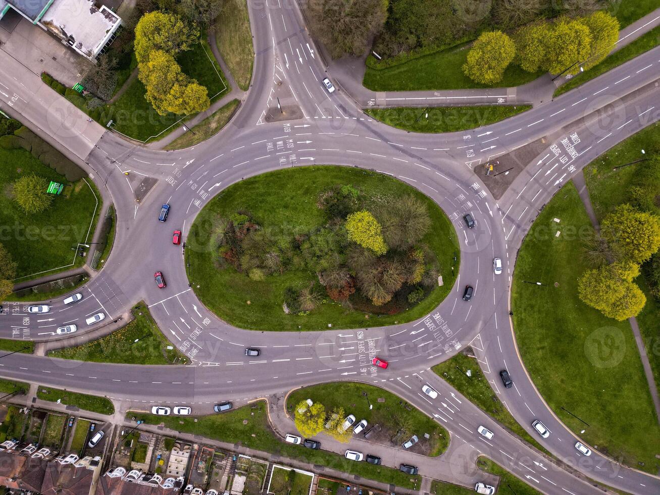 Aerial view of traffic flowing through roundabout in United Kingdom photo