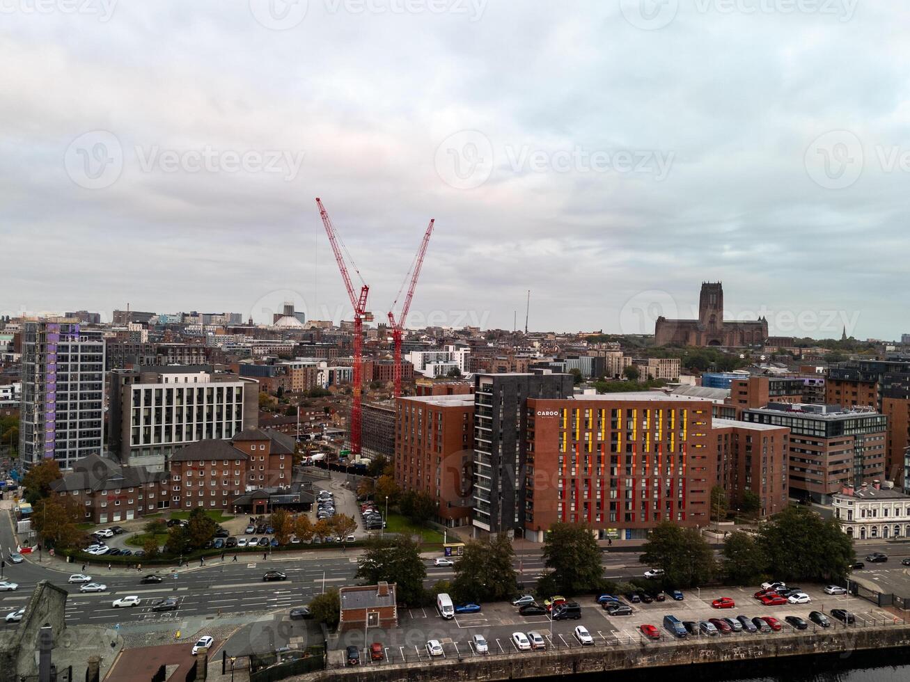 Liverpool cityscape showing construction cranes and anglican cathedral photo