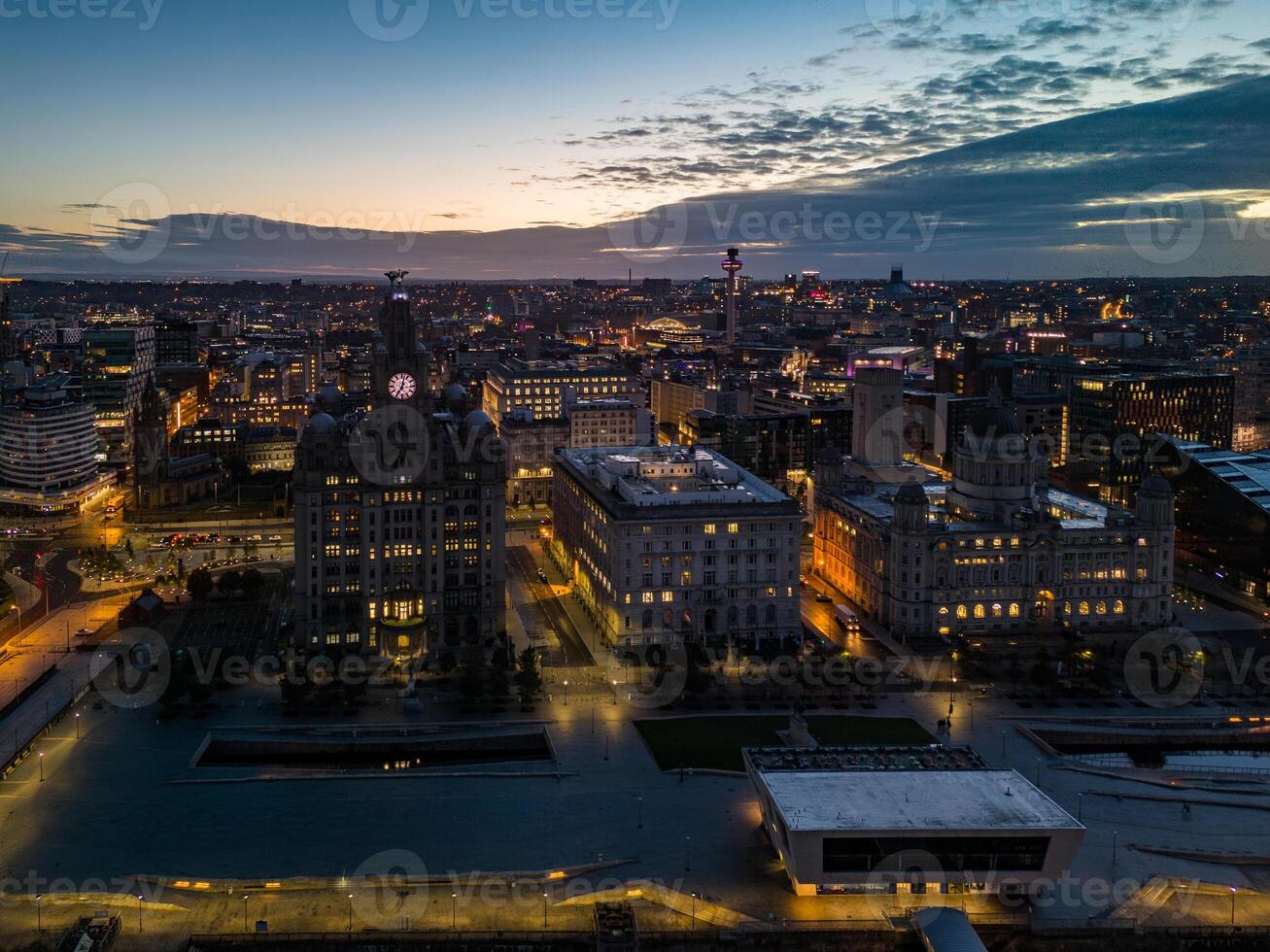 Liverpool Liverpool skyline showing the liver building at dusk with dramatic clouds photo