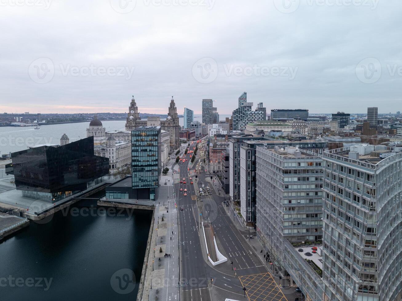 Liverpool skyline showing the three graces and the museum of liverpool at sunset photo