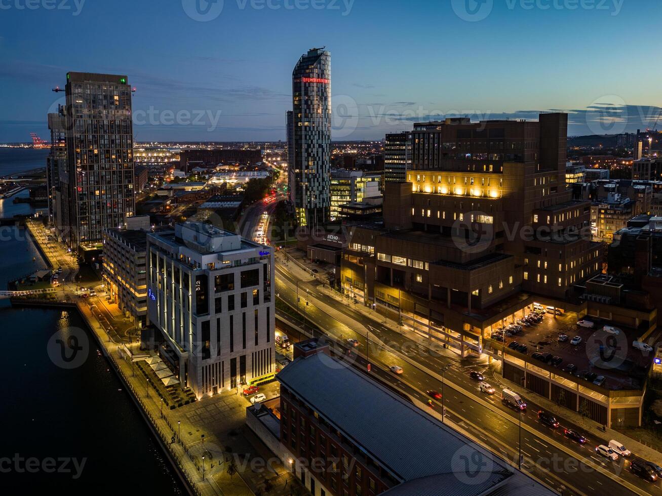 Liverpool Liverpool city centre skyline illuminating during twilight hour photo