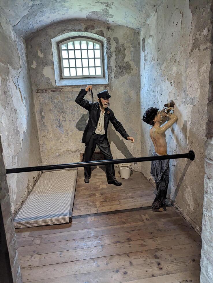 Whipping in a prisoner's cell at Cork City Gaol, Cork, County Cork, Ireland on 16-09-2023 photo