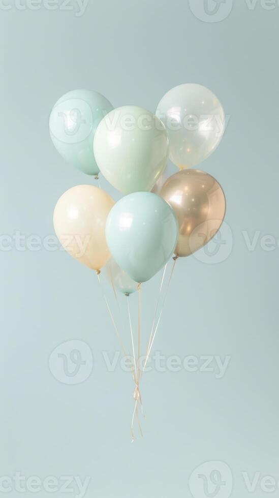 Pastel balloons against a soft blue background floating gracefully photo