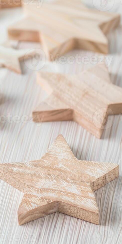 Wooden star decorations on light surface creating a minimalist aesthetic photo