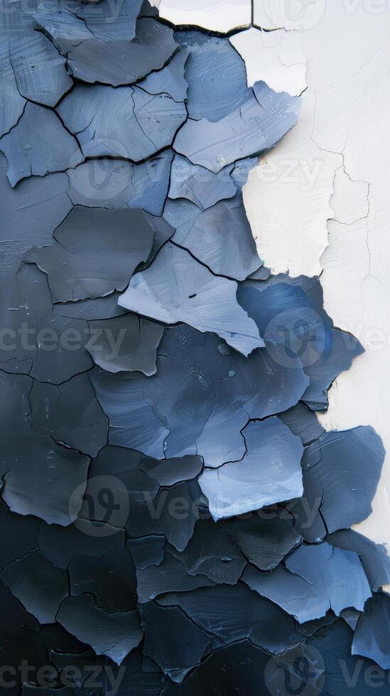 Abstract textured layers of cracked blue and white paint with intricate patterns photo