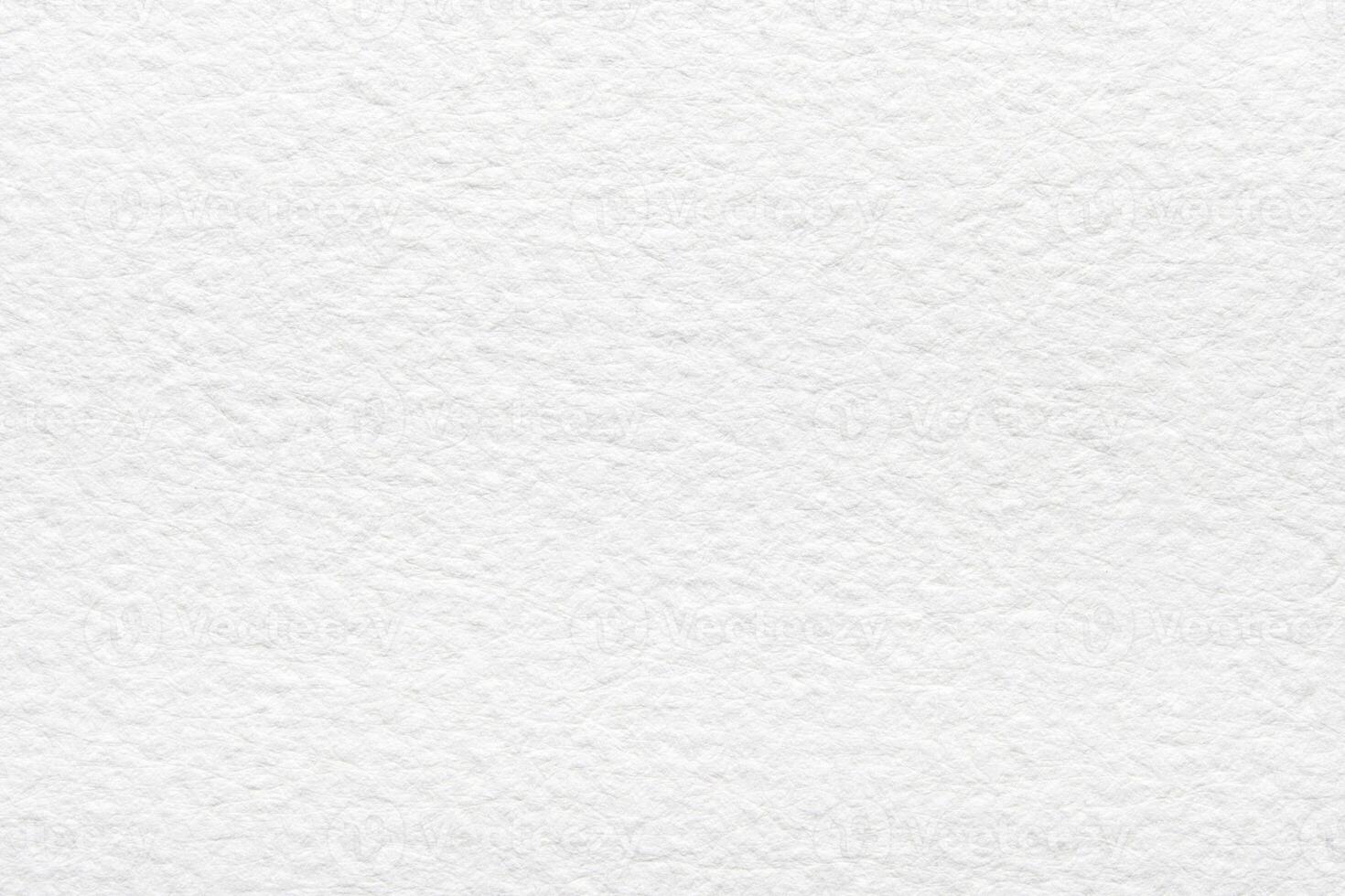 Textured white paper surface with fine grain pattern and subtle fibers. photo