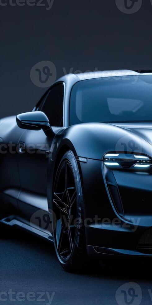 Sleek modern electric car in dimly lit setting featuring aerodynamic design photo