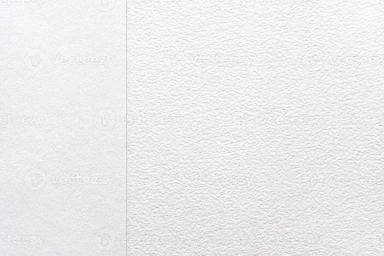 Textured white paper background with subtle patterns for creative design projects. photo
