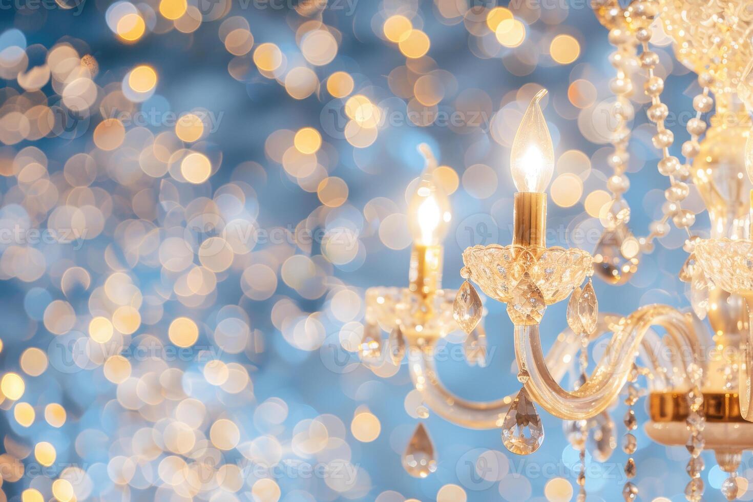 Elegant crystal chandelier with twinkling lights and bokeh effect in a luxurious setting photo