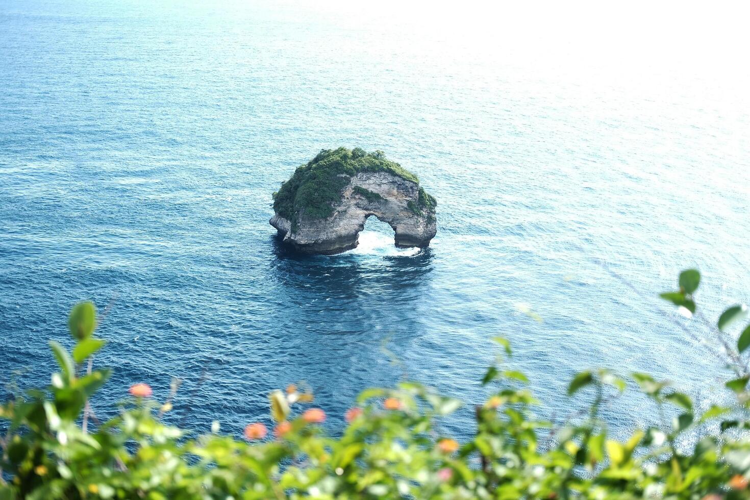 landscape aerial view of Banah Cliff island in blue sea of Nusa Penida, Bali, Indonesia photo