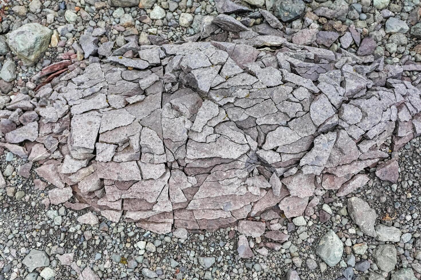 Cracked basalt rock formation showing natural tessellation in iceland photo