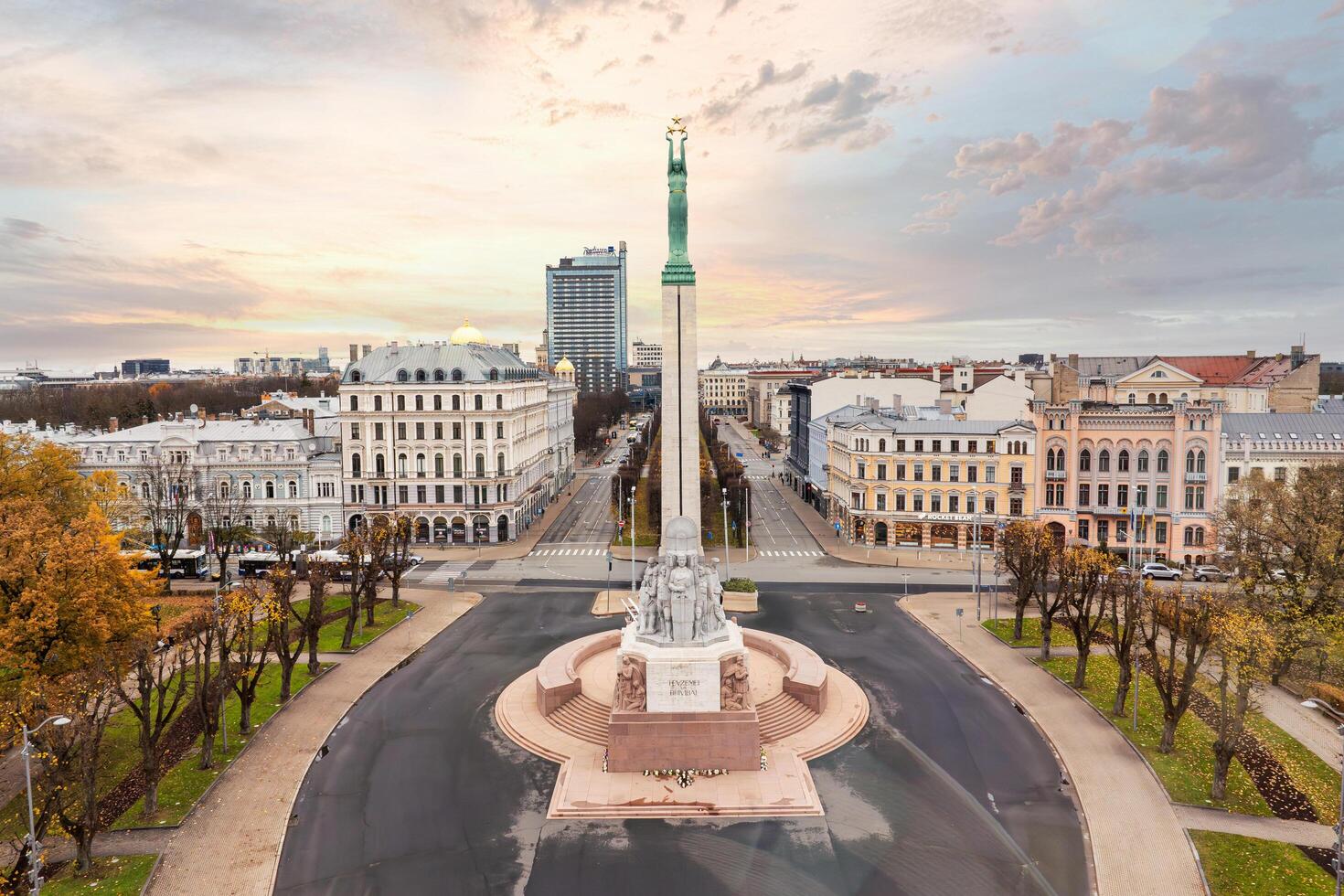 Riga, Latvia, 2024 - Aerial View of Freedom Monument in Riga with Historic Architecture photo
