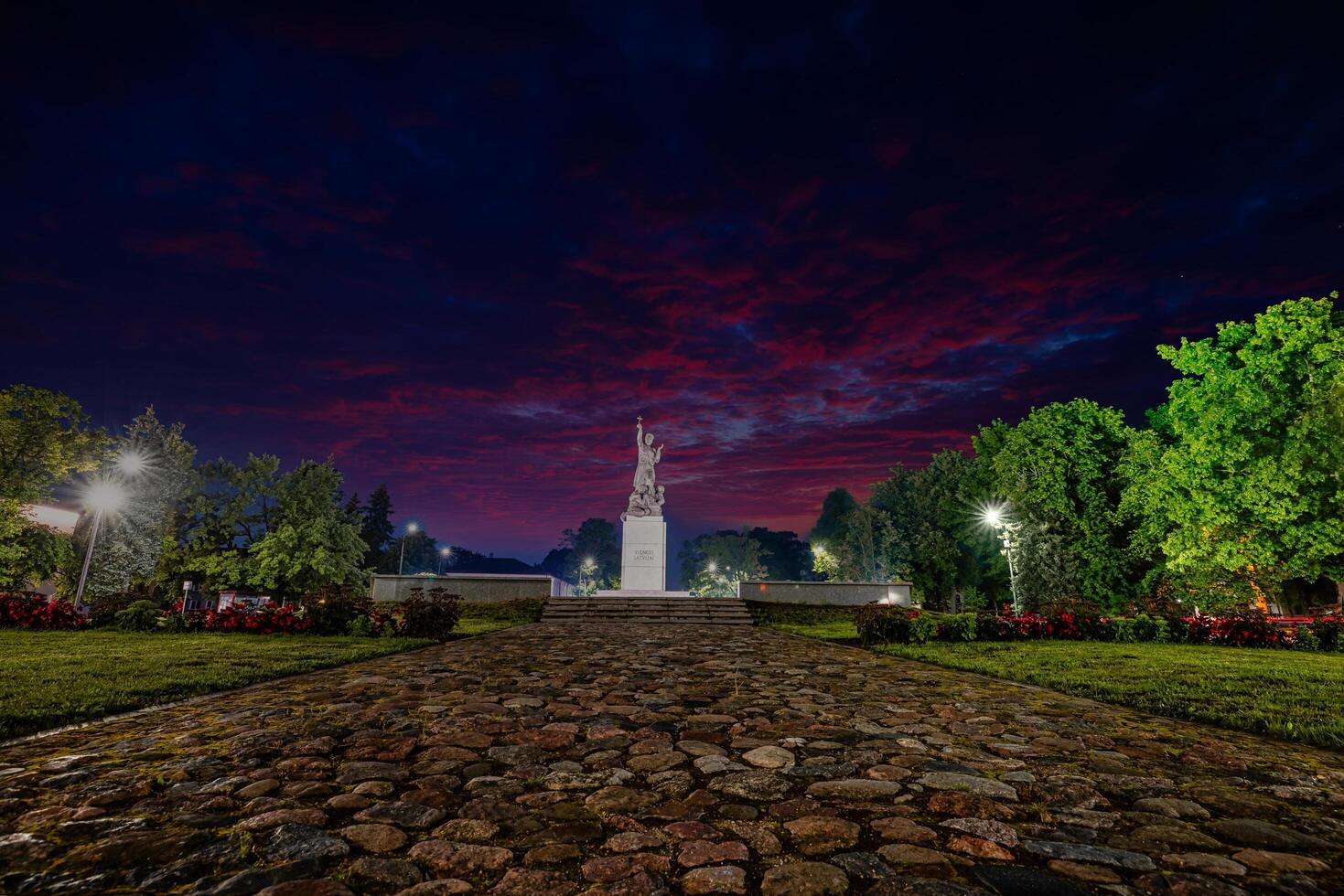Riga, Latvia, 2024 - Monument in Rezekne, Latvia Against a Dramatic Evening Sky photo