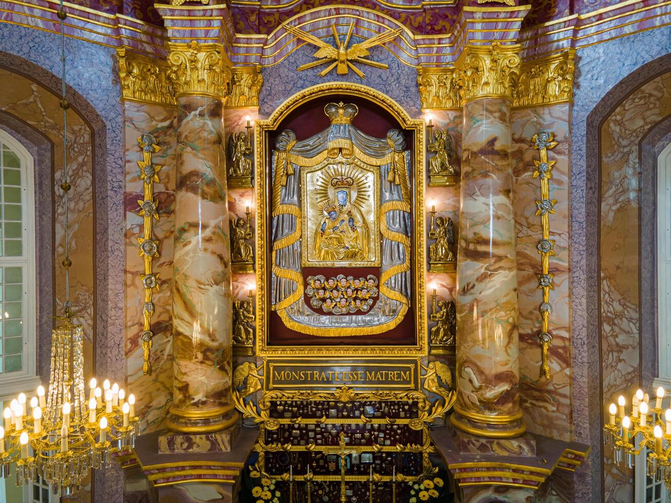 Riga, Latvia, 2024 - Ornate Cathedral Interior with Decorated Altar and Icon photo