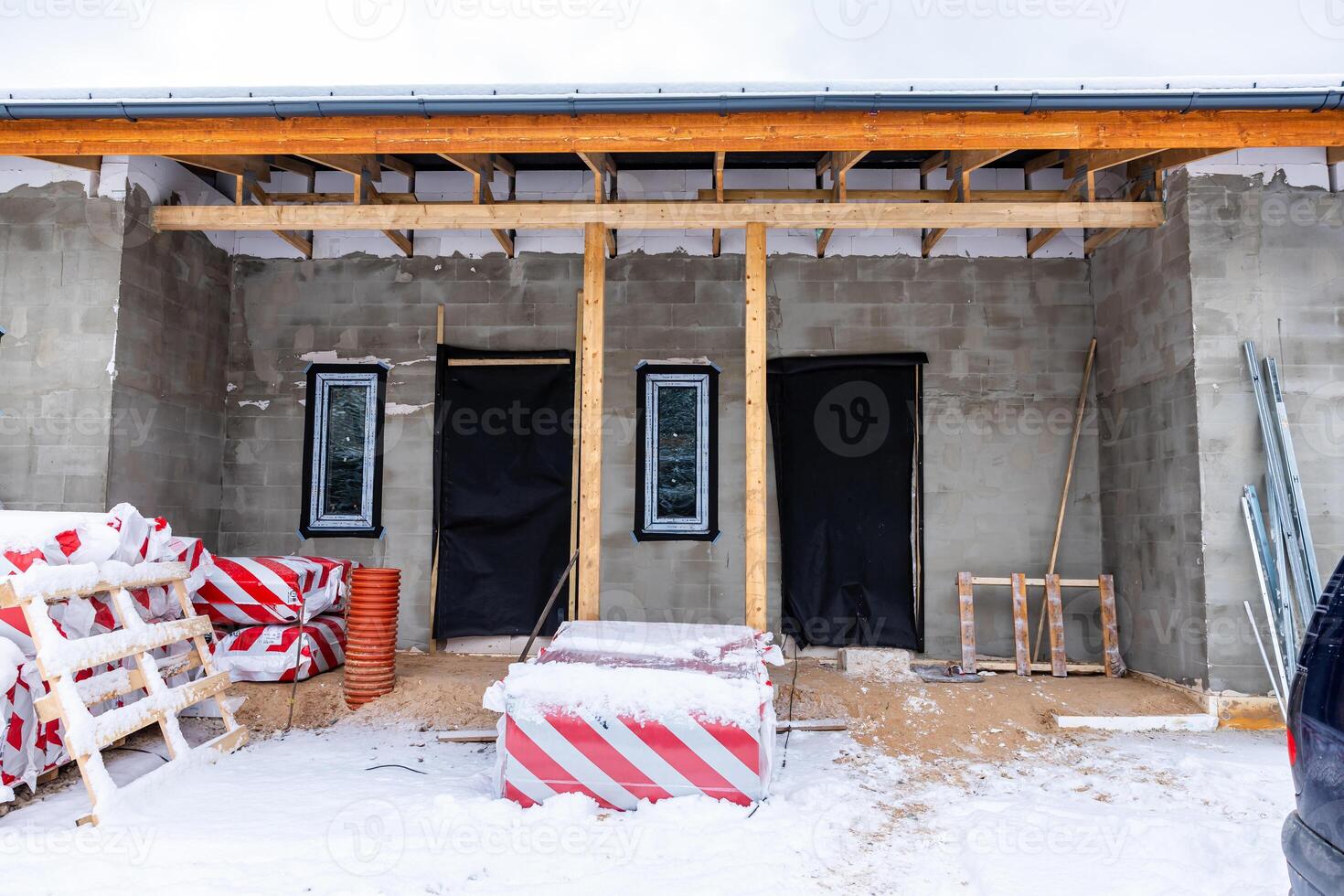 Winter Construction Site with Partially Built Concrete Structure photo
