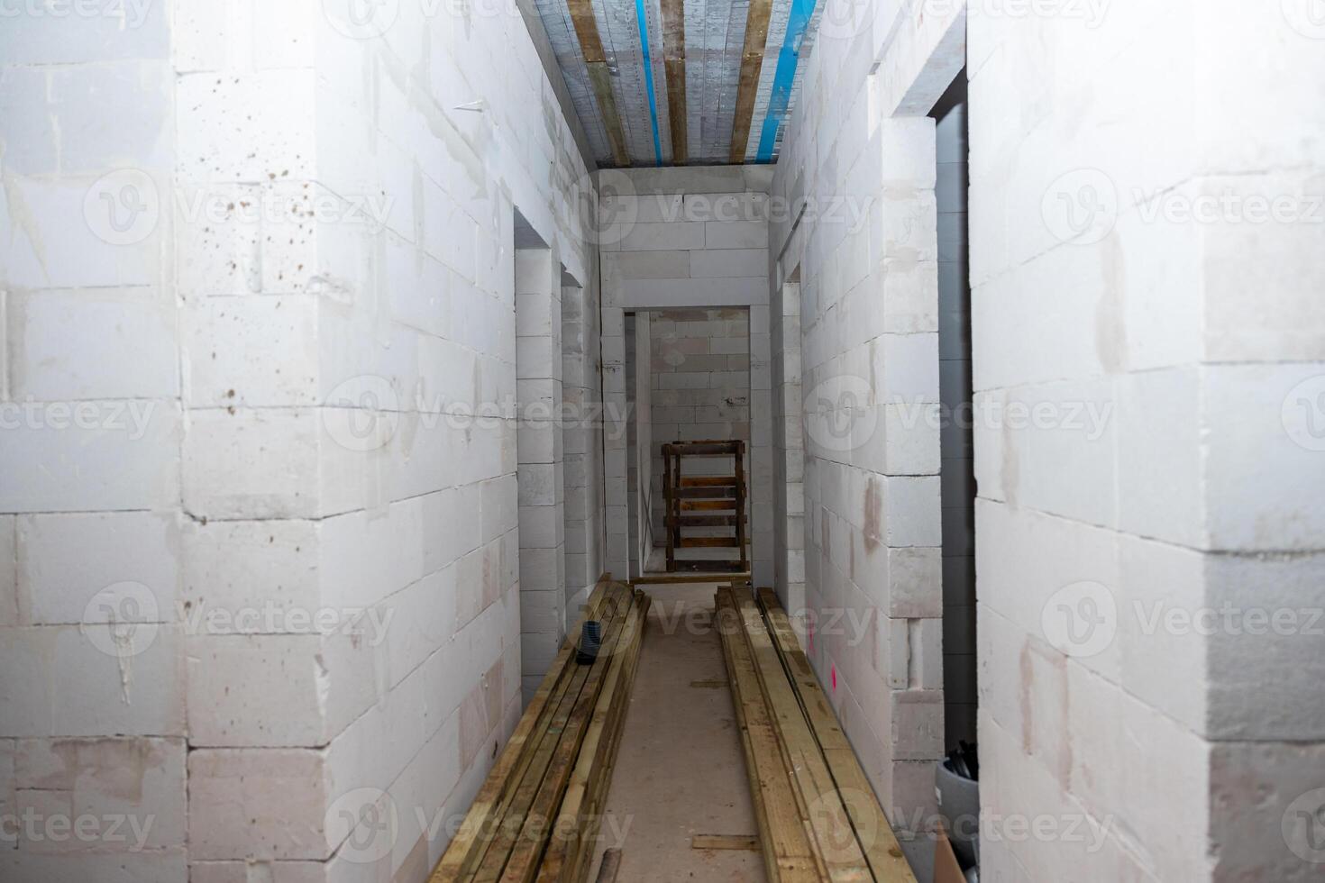 Unfinished Interior Hallway of Building Under Construction photo