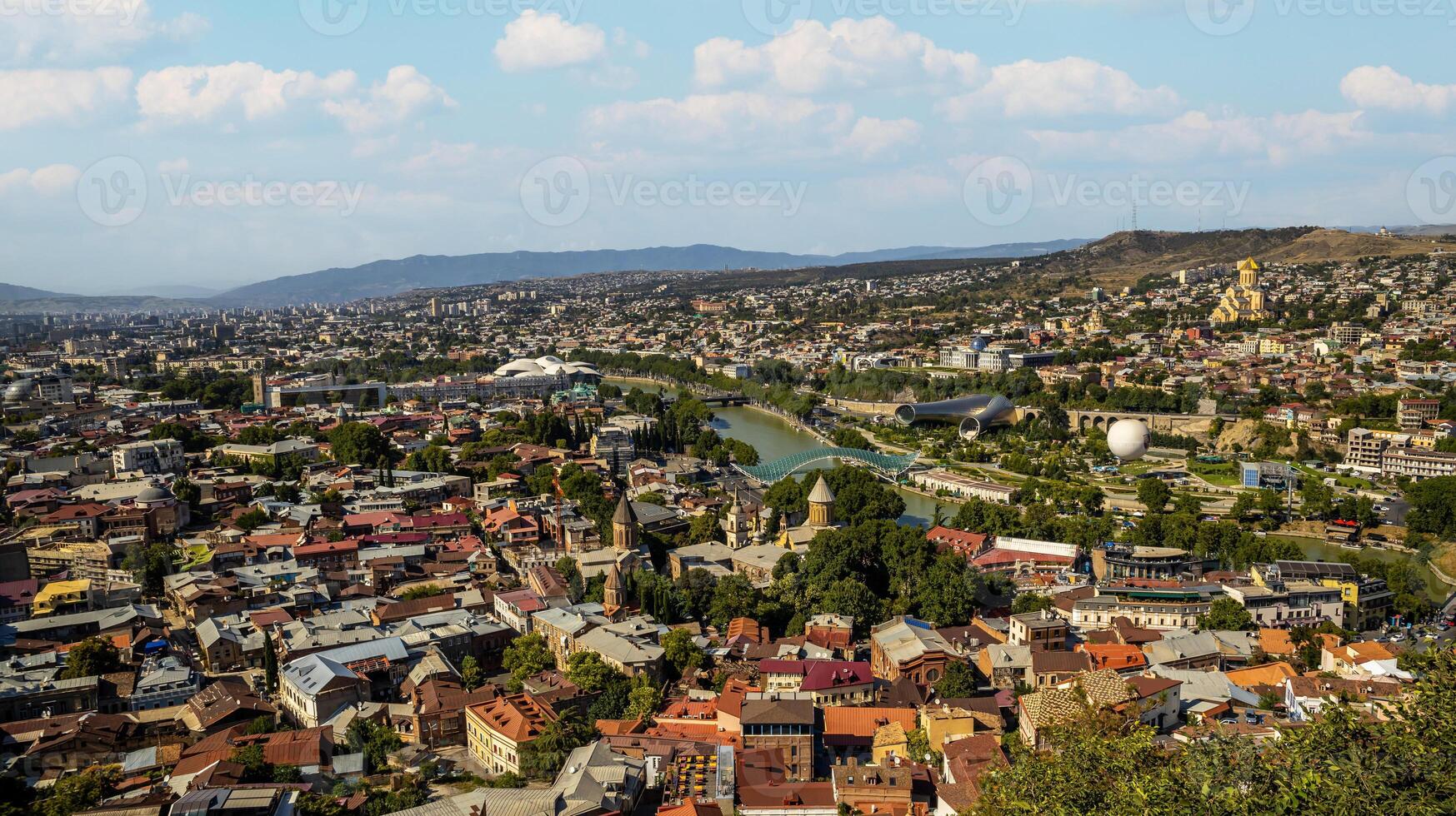 Panoramic View of Tbilisi with Kura River and Sameba Cathedral photo