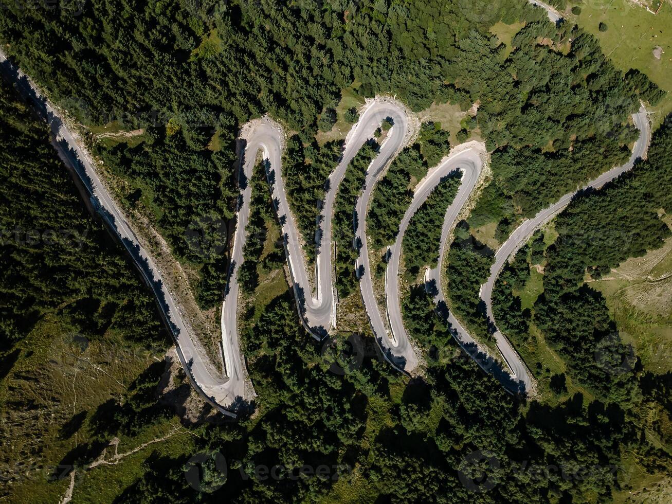 Aerial View of Winding Mountain Road in Forested Georgia Landscape photo