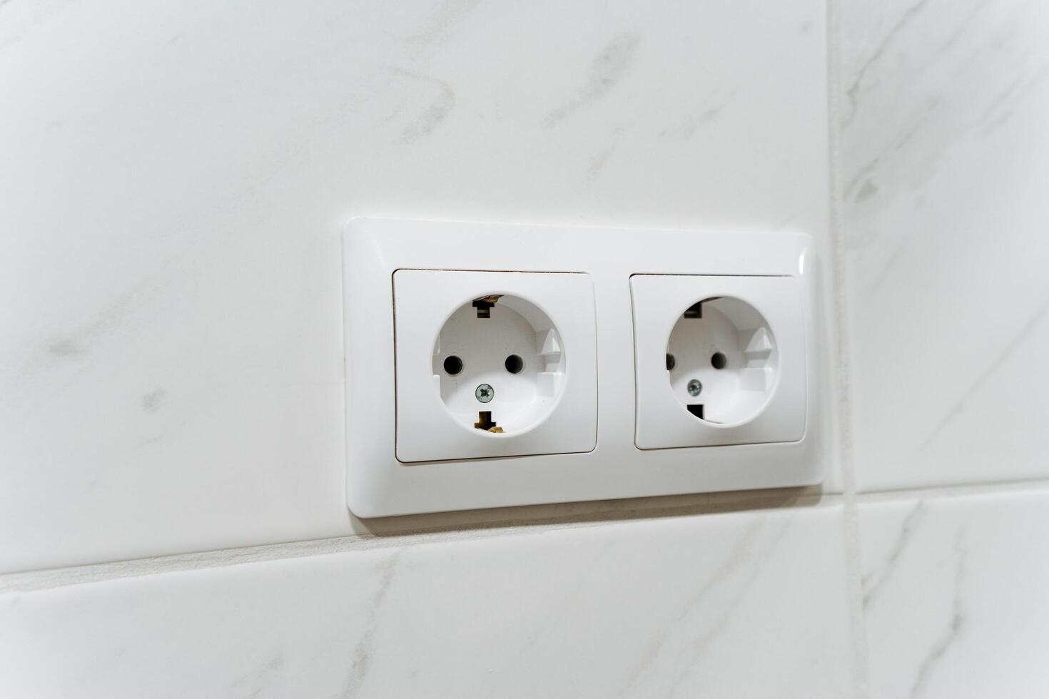 The Modern Double Power Outlet is designed for a Bathroom Setting, improving the overall appearance and convenience of the space while providing essential electricity facilities photo