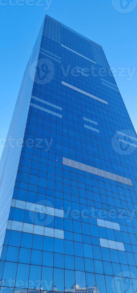 Blue skyscraper with blue sky on the background photo