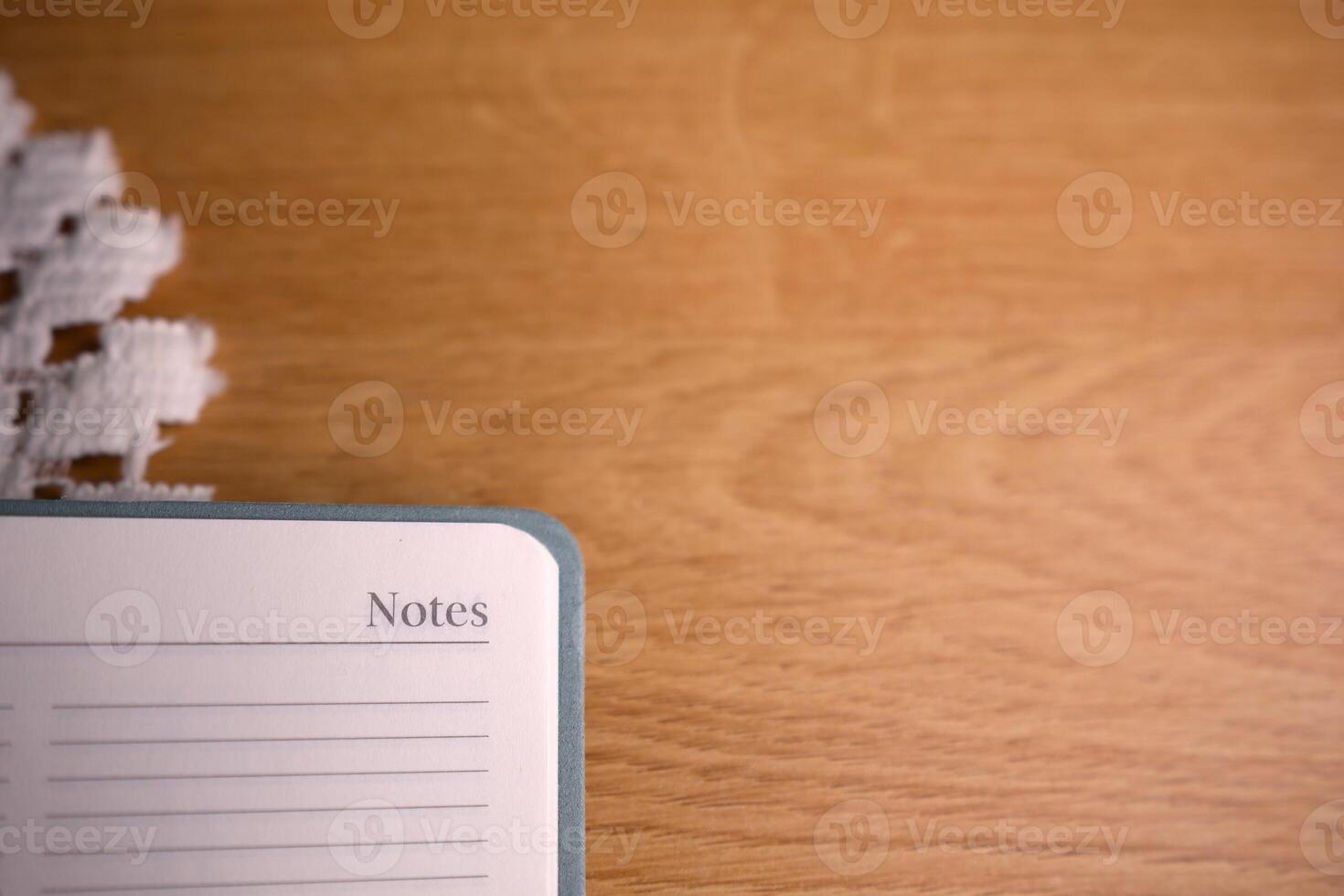 Lined page notes on the desk photo