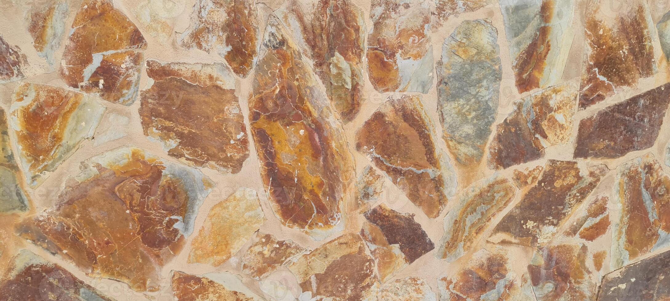 Rustic stone wall with abstract form of the rocks photo