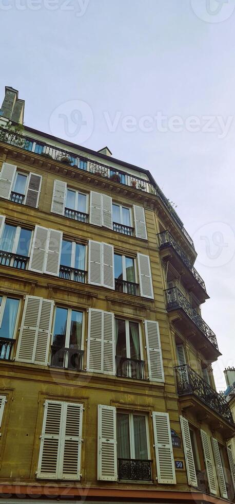 Vintage italian building with white windows photo