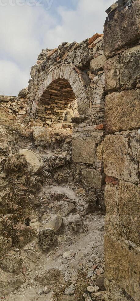 Old ruins with arc vertical photography photo